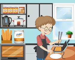 A Man Cooking Waffle in Kitchen vector