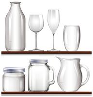 Glasses and bottles on wooden shelves