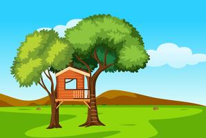 A tree house in nature landscape vector