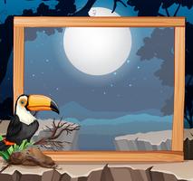 Toucan on wooden frame nature background vector