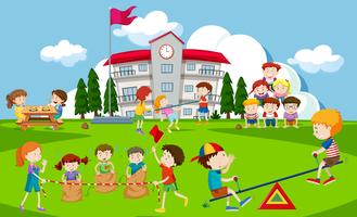 Kids playing at school playground vector