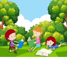 Niños leyendo un libro debajo del árbol vector