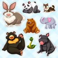 Sticker set with wild animals on blue background vector