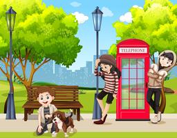 teenagers and dog in park vector