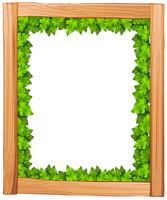 A border design made of wood and green leaves vector
