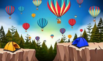 Hot air balloon in nature landscape vector