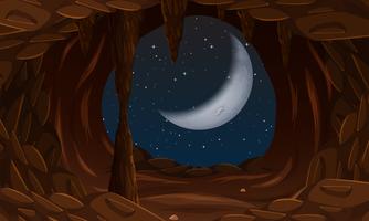 Entrada de la cueva con la luna creciente. vector