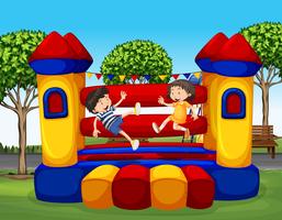 Two kids bouncing on the rubber house vector