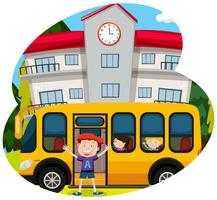 Happy boy infornt of a school bus vector