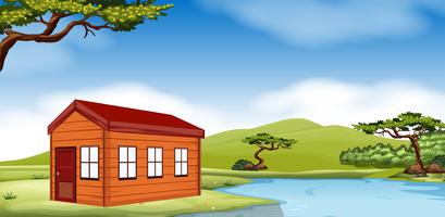 Wooden cottage by the pond vector