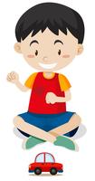 Happy boy playing with toy car vector