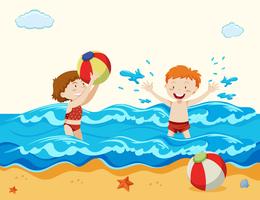 Niño y niña jugando en la playa vector