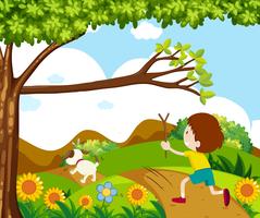 Scene with boy chasing dog in park vector