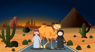 Arab couple with camel on the desert vector