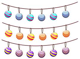 Ornament balls hanging on ropes vector