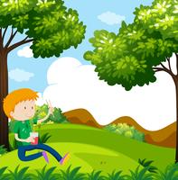 Boy eating noodles in the park vector