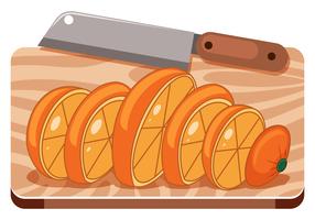 Una naranja en la tabla de cortar vector