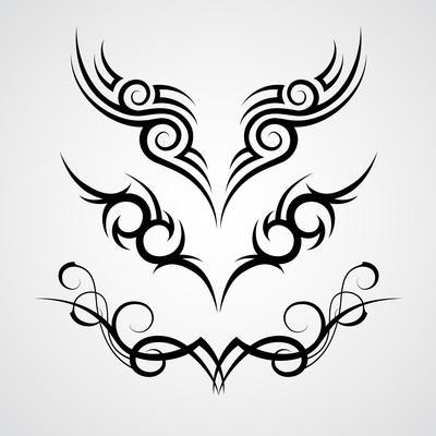 three black tribal tattoo motive on white background