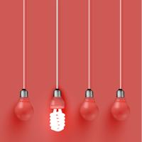 Energy saver lightbulb among old ones, vector illustration