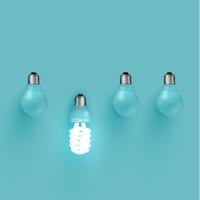 Energy saver lightbulb among old ones, vector illustration