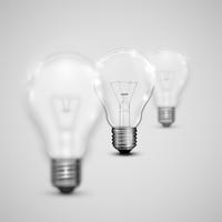 Realistic light bulbs with blurred ones, vector illustration