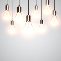 Realistic lightbulbs hanging and working, vector
