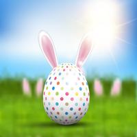 Huevo de Pascua con orejas de conejo vector