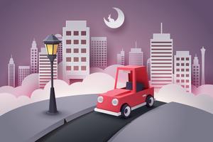 Paper art of red car running out from the city at night vector