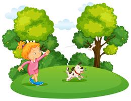 Girl playing with pet dog in park vector