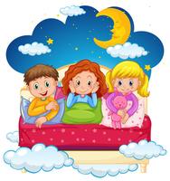 Tres niños en pijama por la noche. vector