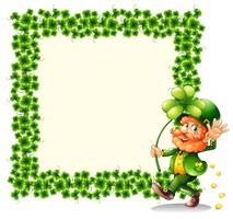 A man holding a clover leaf beside a frame made of leaves vector