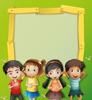 Border template with four kids on the grass vector