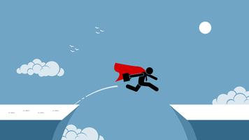 Businessman with red cape taking risk by jumping over a chasm.