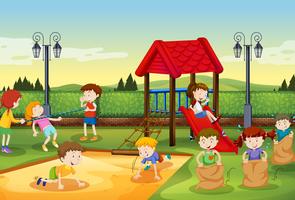 Children playing in the playground vector