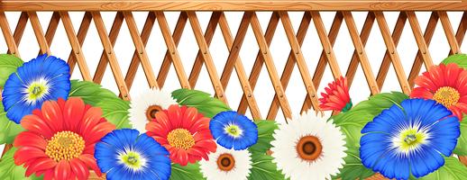 Colourfl flowers near the wooden fence vector