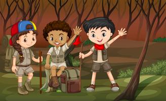 Children hiking in the woods vector