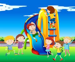 Many children playing on slide vector