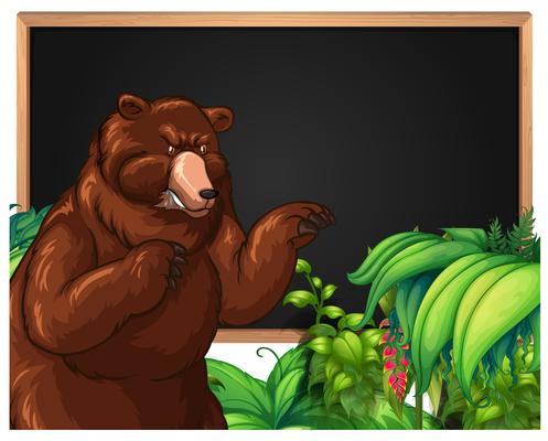 Brown bear and blackboard frame