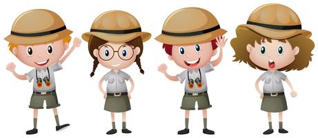 Cuatro niños en traje de safari vector