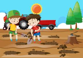 Two boys digging holes on the ground