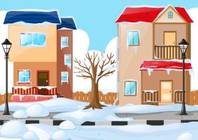 Dos casas cubiertas por la nieve. vector