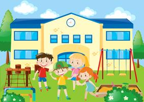 Four students in the school playground vector