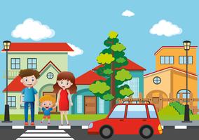 Family crossing street in village vector