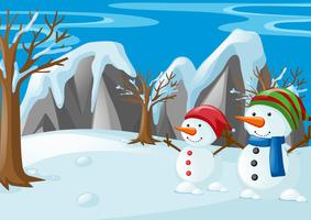 Two snowmen on the snow field vector