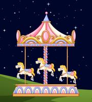 A carousel in the park at night vector