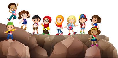 Children from different countries on the cliff vector