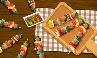 Pinchos de carne kebabs vista aérea vector