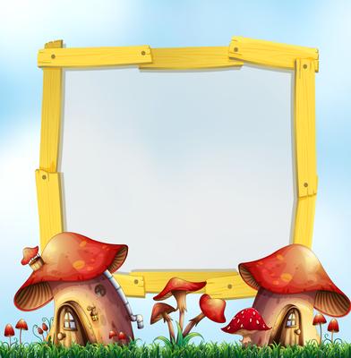 Wooden frame with mushroom houses in garden