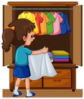 Girl putting away clothes in closet vector