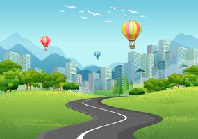 City with tall buildings and balloons vector